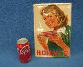 Lot 92. Mint condition 8" x 12" Hohner metal sign.