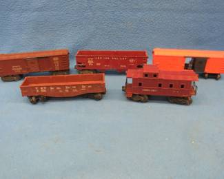 Lot 225. Five train cars. Four are Lionel.