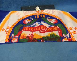 Lot 243. New in the box old style 4' x 6' Minnesota state flag