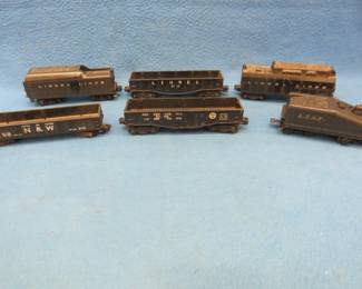 Lot 177. Five Lionel cars and one Gilbert