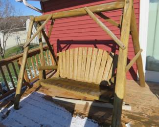 Lot 413. Log swing in good condition. This is partially disassembled to aid in transport