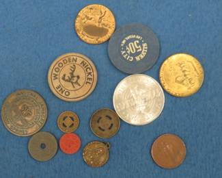 Lot 269. Transportation tokens, ration coins, and more