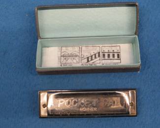 Lot 51. Hohner Pocket Pal 10-hole diatonic harmonica and box with paper in excellent condition.