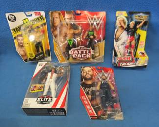 Lot 324. Five wrestling figurines