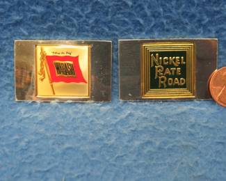 Lot 321. Two sterling silver ingots from "The Great American Railroad Emblems" series. The Wabash and the New York Chicago & St. Louis. Total weight 45.56 grams.