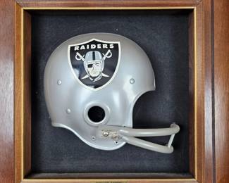 Lot #B31 - Vintage Oakland Raiders Riddell Football Helmet Wall Display - Classic NFL Memorabilia