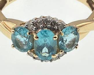 Three stone blue topaz and diamond cris cross ring
