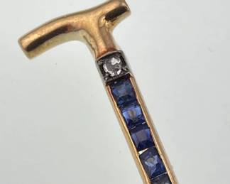 Gold, sapphire and diamond riding crop pin
