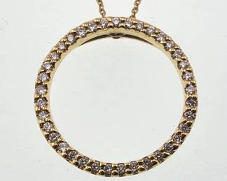 18kt gold Roberto Coin diamond circle pendant and chain