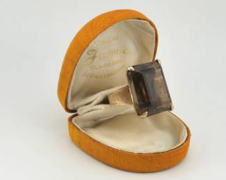 Impressive 18kt smokey topaz dinner ring; approx. 30 ctw.