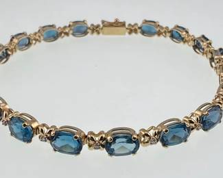 14kt and blue topaz and diamond accent bracelet