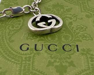 Gucci sterling silver bracelet with double GG charm