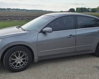 2008 Nissan Altima, 133,000 + miles, silver with black cloth interior. PICTURES COMING SOON. Will be sold by sealed bid.