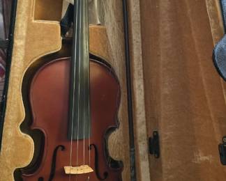 This is a student violin with case.