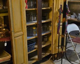 Basement left, primitive cabinet.