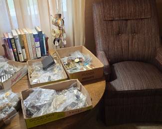 Costume jewelry in the living room on the round coffee table.