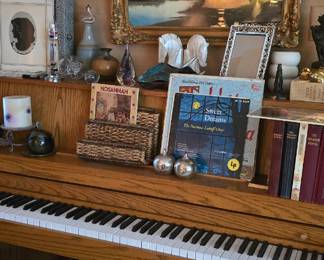 Piano is in the living room which is to your left as you enter the house.