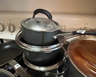 #99	Set of 6 pieces of Calphalon Pots & Lids	 $20.00 