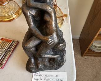 #116	1961 Vintage Replica of Auguste Rodins "The Kiss" Cast Stone w/bronze finish - 10"	 $30.00 