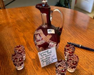 #66	German Ruby Red Cut Glass Decanter w/stopper & 5 shot glasses	 $45.00 