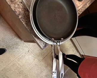 #98	Calphalon Set of 3 - 2 skillets and large lid	 $35.00 