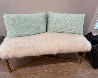 White furry bench 