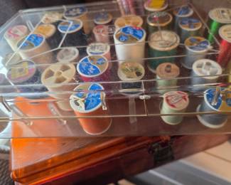 Vintage Thread Spools in Orange-Toned Plastic Case