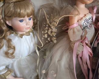 Vintage Porcelain Dolls with Elaborate Gowns
