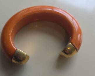 Orange Bakelite Cuff Bracelet with Gold Tone Caps