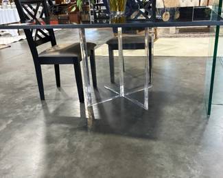 Granite top dining table on Lucite base