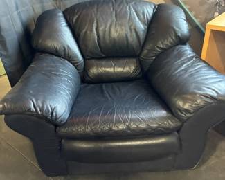 Leather overstuffed lounge chair