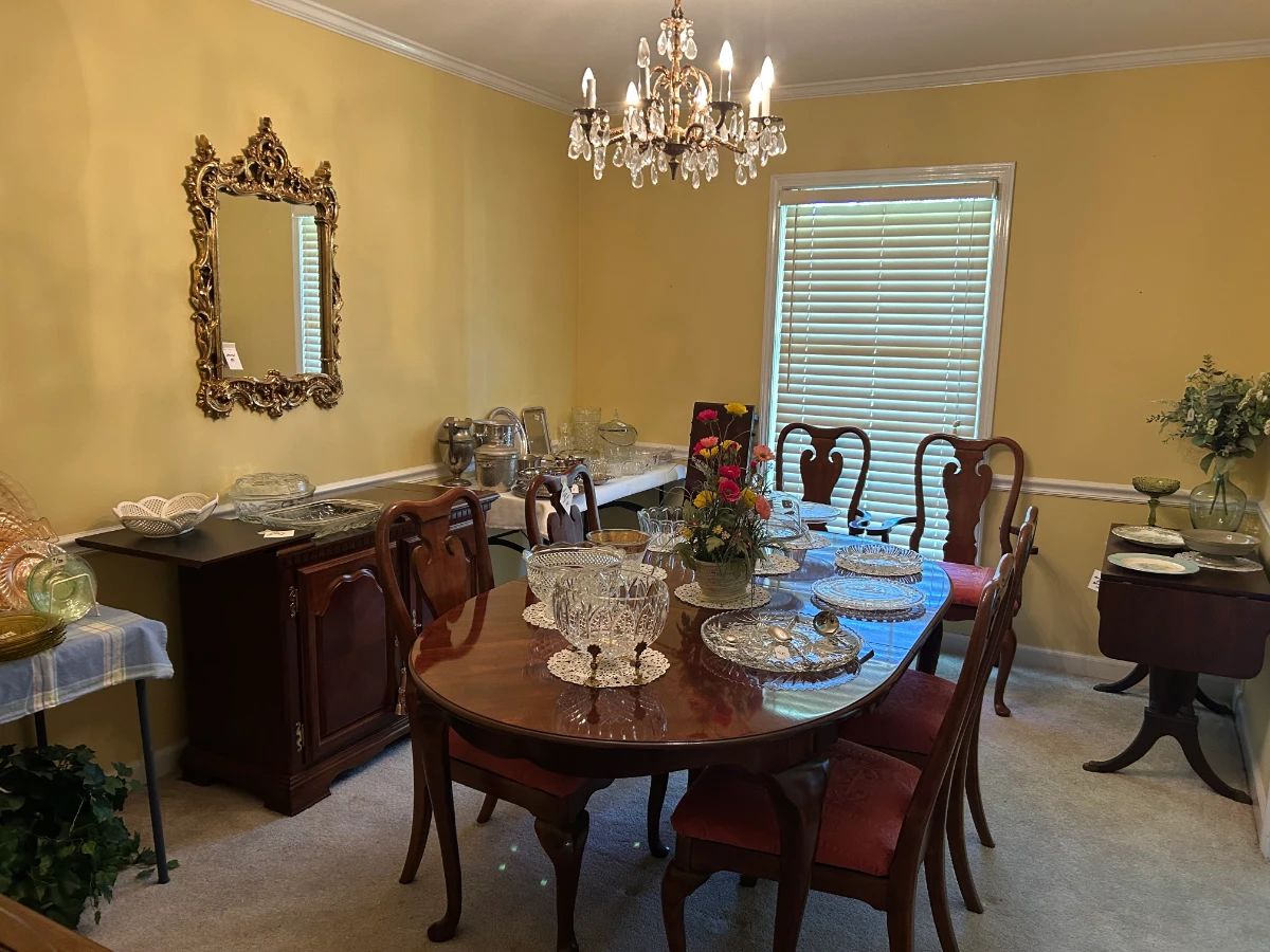 Mirror, servers, queen anne dining table and chairs, crystal, florals, glassware