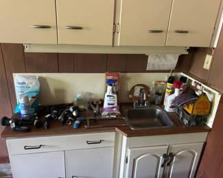 cleaning supplies and such, coke holder