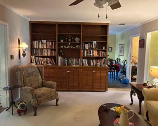 books, wingback chair, UGA stuff