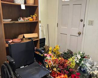 wheelchair, silk flowers, pots