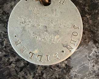 Engraved Metal Disc with Ring - JOHN BUTLER