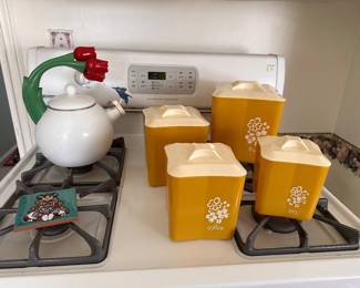 Vintage nesting plastic yellow canister set 1960s