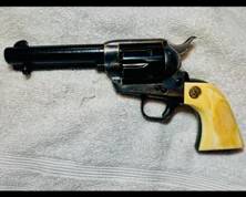 Colt Single Action Frontier Six Shooter   .44 WCF caliber. Old ivory grips (pre ban, mid 1930's era)     Black powder style frame.  4 3/4 barrel.   Gun is about 42 to 45 years old.   Professionally tuned action    3rd generation Colt from 1983 Colt custom shop build 