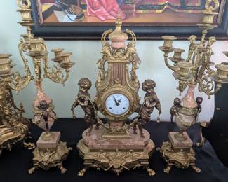 European Candelabra - clock keeps good time and chimes work