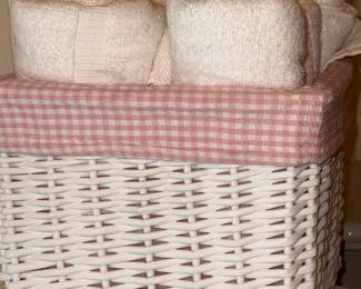 White Wicker Storage Basket with Pink Gingham Liner and Rolled Towels