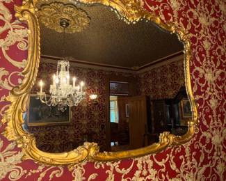 Ornate Giltwood Rococo Mirror with Damask Wallpaper