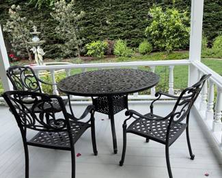 Cast Iron Wildflower Patio Set with Oval Table and Four Chairs