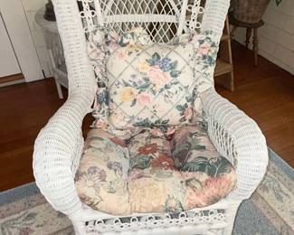 White Wicker Rocking Chair with Floral Cushions
