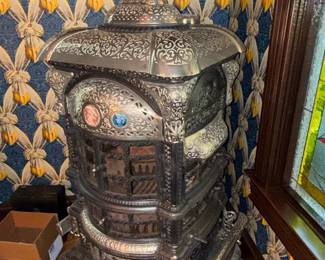Ornate Cast Iron Parlor Stove with Ceramic Medallions