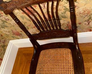 Antique Oak Spindle Back Armchair with Carved Crest Rail and Cane Seat