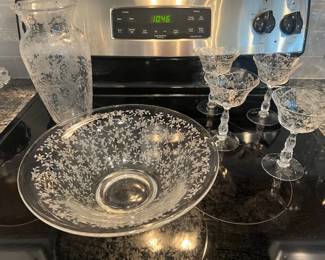 Elegant glass bowl, vase and stems
