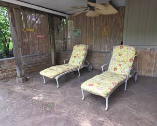 Pair of iron lounge chairs