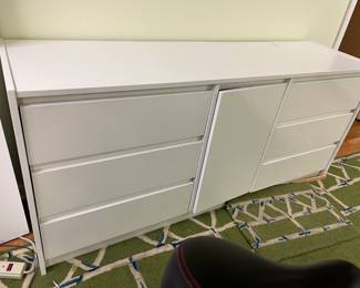 Awesome piece!  This white 6 drawer and middle cabinet is solid as a rock!  Wonderful for a bedroom, dining room, game room...ANYWHERE!