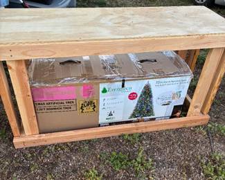 Wooden bench and large Christmas tree 