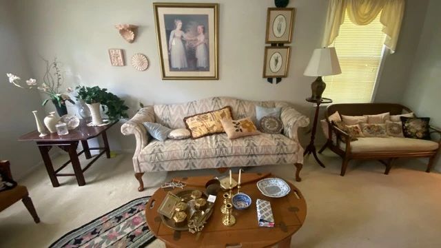 Beautiful decor with lots of Baldwin brass and ceramic pieces by Lenox, Andrea by Sadek, needlepoint pillows